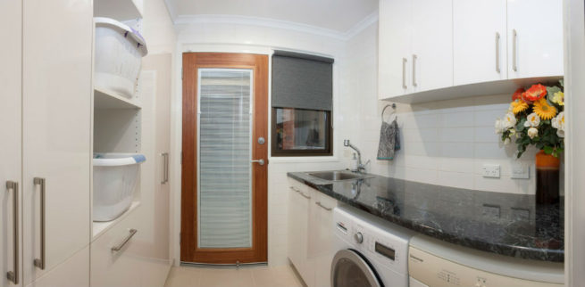 Laundry with timber-framed door